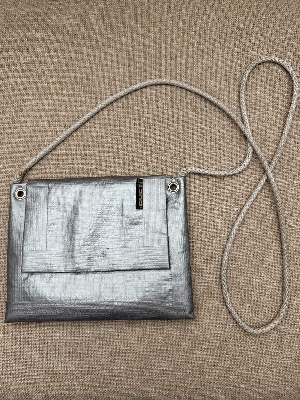 Metallic Silver Crossbody Pouch with Braided Strap